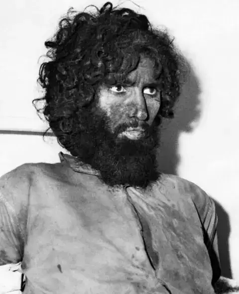 被捕后的朱海曼·欧泰比