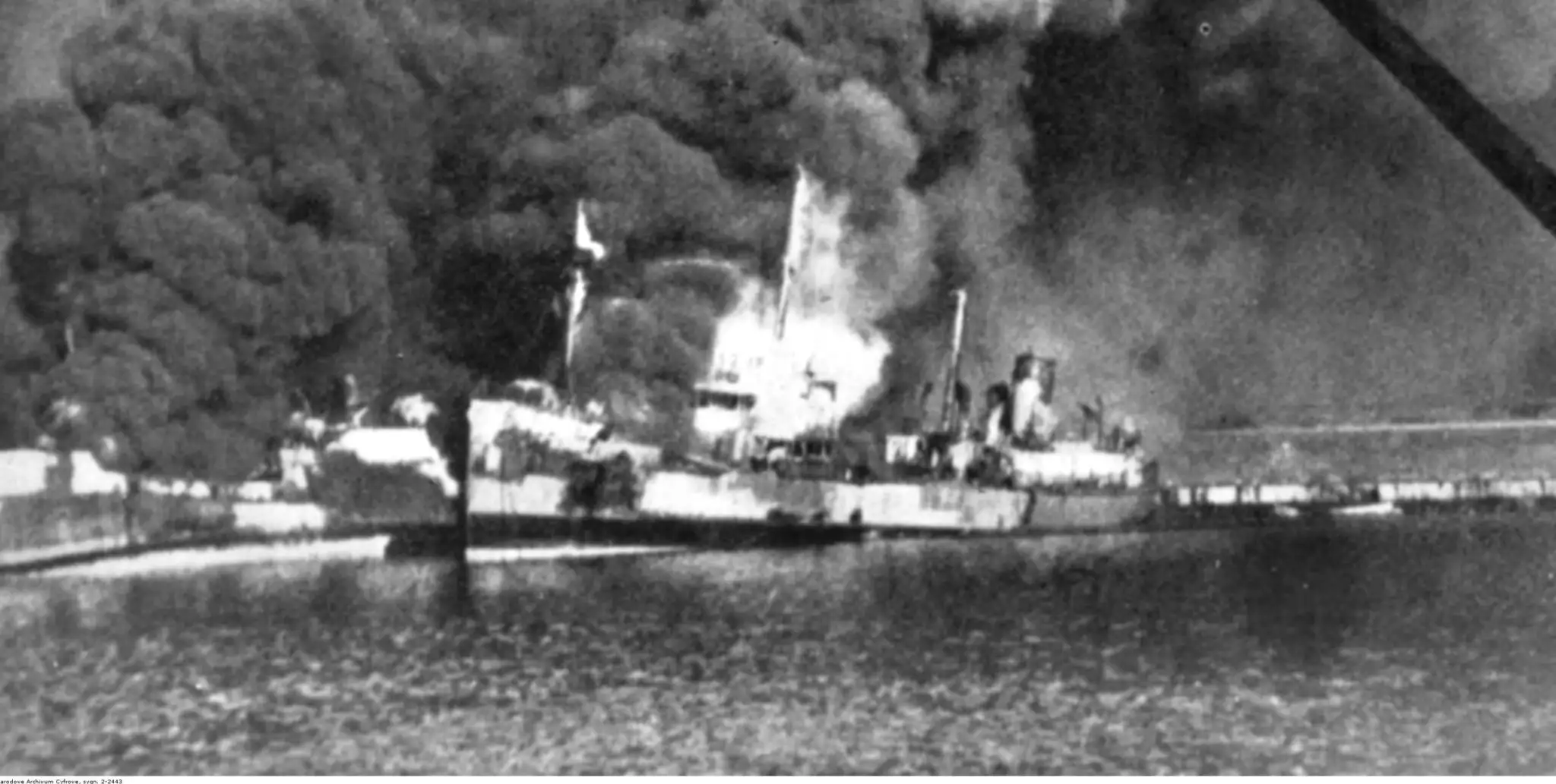 A photograph of a damaged Allied ship after the Luftwaffe raid of Bari Harbour, Italy, December 2, 1943