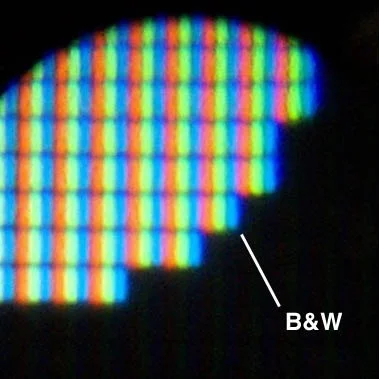Close-up photograph of LCD showing subpixel rendering in action
